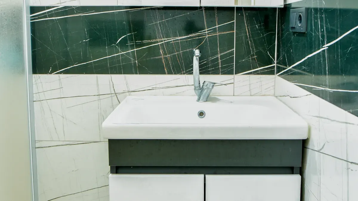 Using Color, Finish, and Grout to Brighten and Expand Your Bathroom